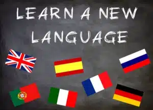 Image avec les drapeaux de plusieurs pays : France, Espagne, Allemagne, Italie, Portugal, Royaume Unis et Russie. "learn a new language" - stages d'anglais, d'allemand et d'espagnol - Vend'études